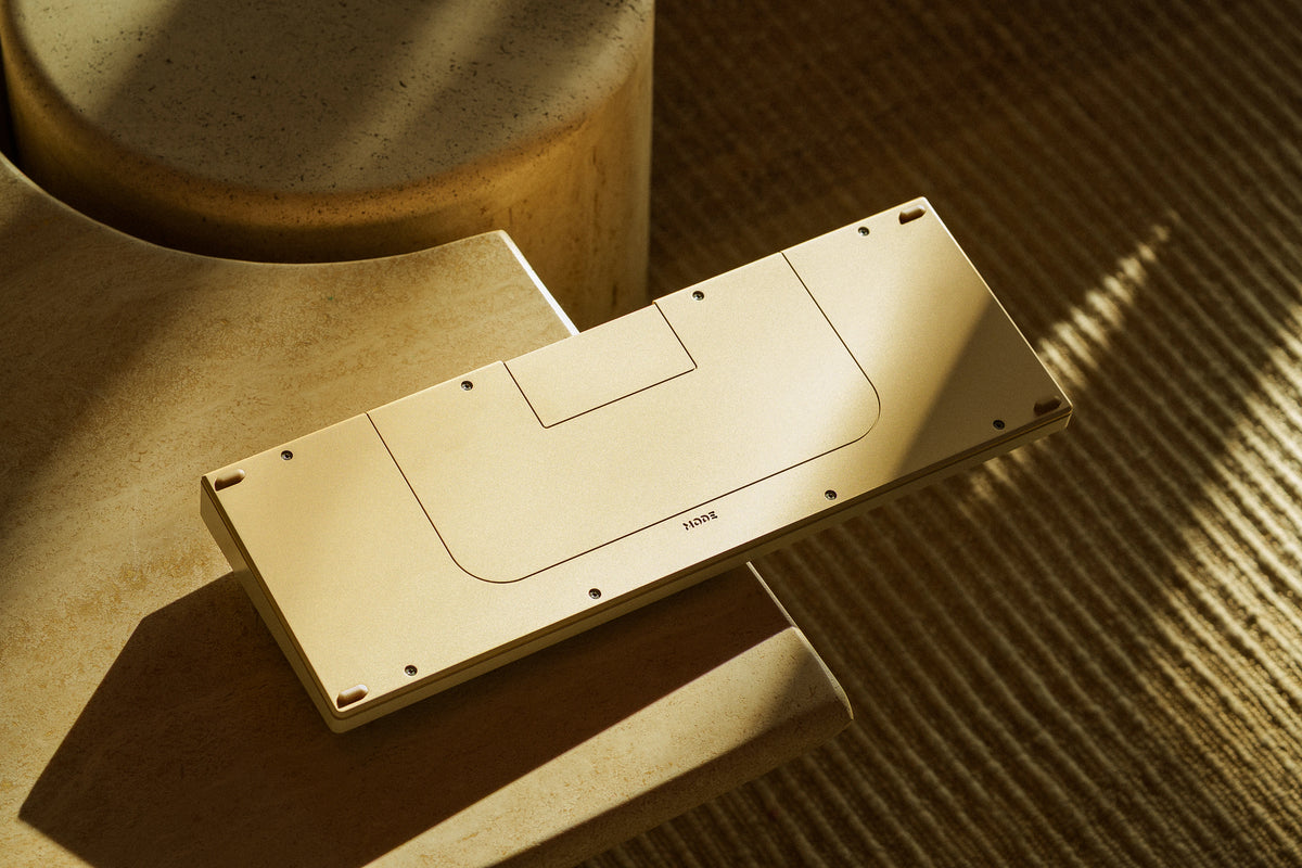 Underside of a Mode Prologue in Golden Beige resting on a stone side table